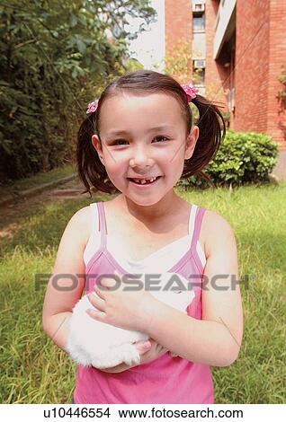 Picture - blonde hair, carefree, casual, cheerful. Fotosearch