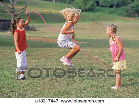 Stock Photo - blonde hair, carefree, casual, cheerful. Fotosearch