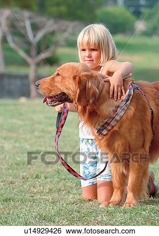 Stock Photograph - blonde hair, carefree, casual, cheerful, close-up. Fotosearch