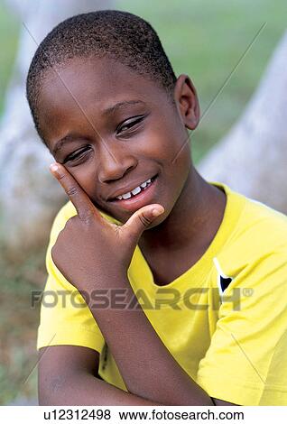 carefree, toothy smile, lifestyle, smiling, cheerful, grass View Large Photo Image Stock Photo - carefree, toothy smile, lifestyle, smiling, cheerful, grass. Fotosearch