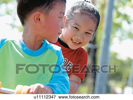 Stock Photo - girl, carefree, smiling, happy, relative. Fotosearch