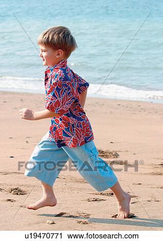 Stock Image - happiness, child, blonde hair, youth, shirt, leisure. Fotosearch