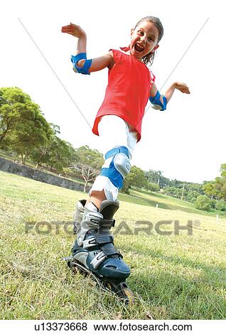 innocence, playing, one person, standing, day, youth View Large Photo Image Stock Photo - innocence, playing, one person, standing, day, youth. Fotosearch