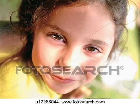 Picture - lifestyle, grinning, blonde hair, casual, happy, smirking, human face. Fotosearch