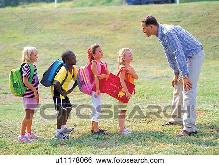 medium length hair, carrying, casual, day, shadow View Large Photo Image Stock Photograph - medium length hair, carrying, casual, day, shadow. Fotosearch
