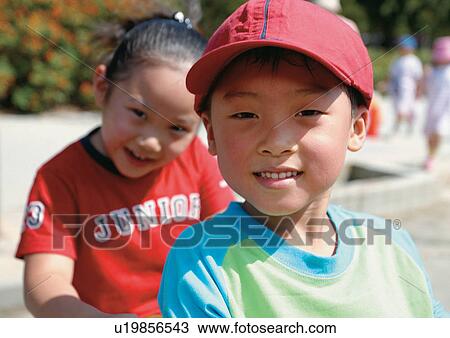Stock Image - youth, toothy smile, leisure, relative, child, kid. Fotosearch