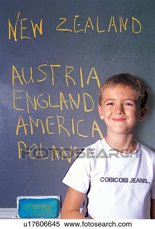 Stock Photography - blackboard, blonde hair, boy, carefree, casual. Fotosearch