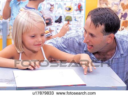 blonde hair, book, button down shirt, casual View Large Photo Image Stock Image - blonde hair, book, button down shirt, casual. Fotosearch