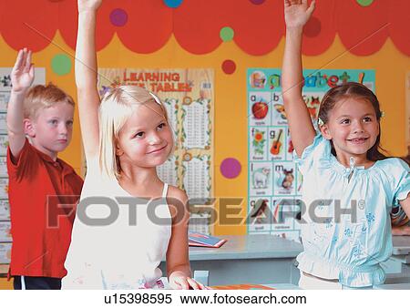 Stock Photography - blonde hair, boy, three people, female, smiling, toothy smile. Fotosearch