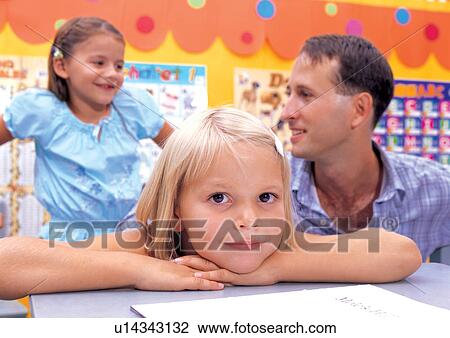 Stock Image - blonde hair, casual, cheerful, child. Fotosearch