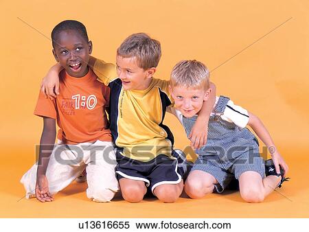 Stock Photography - boys, young, blonde hair, three people, sitting, child. Fotosearch