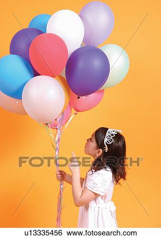 carefree, medium length hair, balloons, culture, kid, blonde hair View Large Photo Image Stock Photograph - carefree, medium length hair, balloons, culture, kid, blonde hair. Fotosearch
