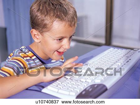 Stock Photo - casual, culture, indoor, close-up, happy, children's wear, childhood. Fotosearch
