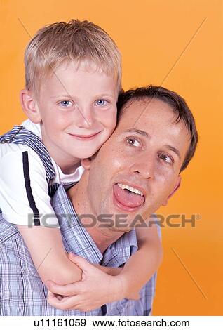 Stock Photo - child, childhood, carefree, two people, head and shoulders, smiling. Fotosearch