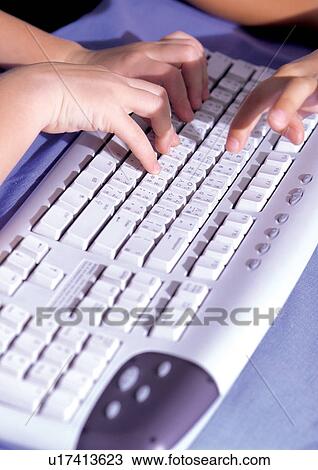 Stock Image - culture, close-up, human hands, electronic device, child. Fotosearch