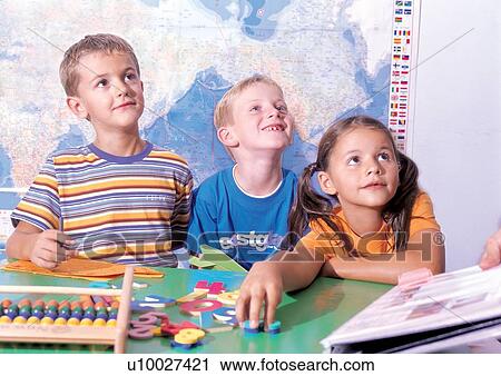 Stock Image - four people, head and shoulders, culture, indoor, cheerful. Fotosearch
