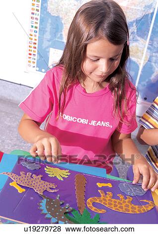 Stock Photo - friends, t-shirt, blonde hair, casual, innocence, happiness. Fotosearch