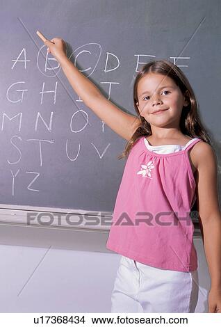 holding, standing, casual, children's wear View Large Photo Image Picture - holding, standing, casual, children's wear. Fotosearch