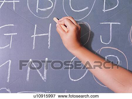 Stock Photo - holding, writing, human hands, close-up, leisure. Fotosearch