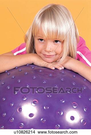 Picture - indoor, straight hair, grinning, lifestyle, girl, happiness, happy. Fotosearch