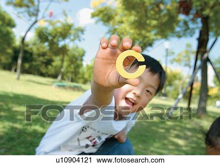 Stock Image - short sleeved, childhood, casual, leisure, child. Fotosearch