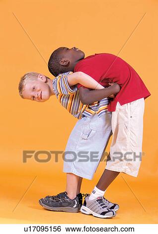 Stock Photograph - t-shirt, friends, boy, brother, leisure, children, male. Fotosearch