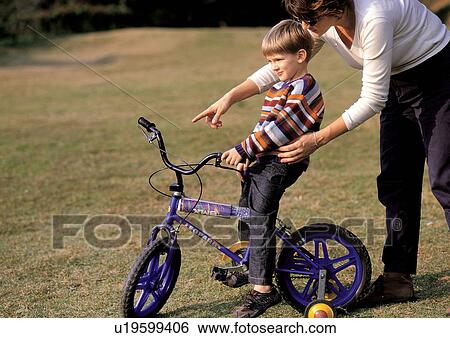 bicycle, childhood, bonding, 4-5 years View Large Photo Image Stock Photograph - bicycle, childhood, bonding, 4-5 years. Fotosearch