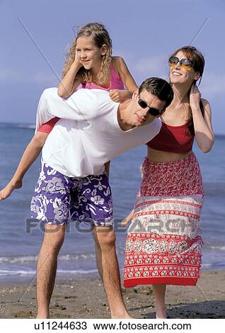 Stock Image - bonding, child, carrying on shoulder, 7-8 years. Fotosearch
