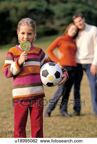 bonding, daughter, candy, 7-8 years View Large Photo Image Stock Image - bonding, daughter, candy, 7-8 years. Fotosearch