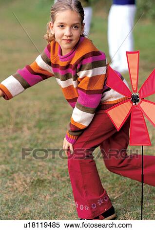family, happiness, looking down, children's wear, culture View Large Photo Image Stock Photography - family, happiness, looking down, children's wear, culture. Fotosearch