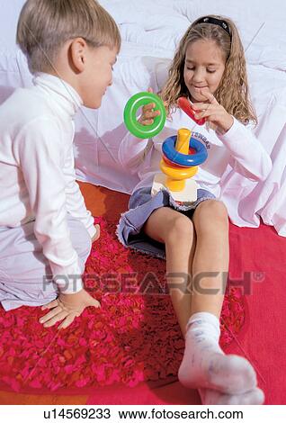 family, toy, young girl, culture, children, happiness, lifestyle View Large Photo Image Stock Image - family, toy, young girl, culture, children, happiness, lifestyle. Fotosearch