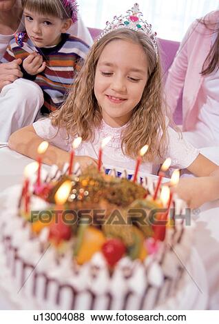 looking away, cap, 7-8 years, candles, indoor, cake View Large Photo Image Stock Photo - looking away, cap, 7-8 years, candles, indoor, cake. Fotosearch