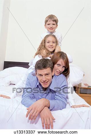one on top of the other, brother, happiness, 4-5 years, unit, with families View Large Photo Image Stock Photo - one on top of the other, brother, happiness, 4-5 years, unit, with families. Fotosearch
