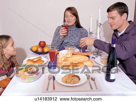 parents, enjoyment, family with one child, food and drink, breads View Large Photo Image Stock Image - parents, enjoyment, family with one child, food and drink, breads. Fotosearch