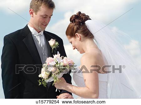 Brown Hair, Day, Full Suit, Hair Bun, Holding View Large Photo Image Picture - Brown Hair, Day, Full Suit, Hair Bun, Holding. Fotosearch