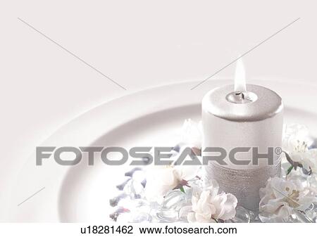 Stock Image - Candle, Burning, Plate. Fotosearch