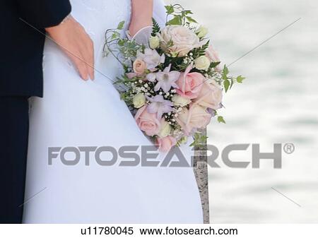 Holding, Standing, Full Suit, Wedding Dress, Close-Up View Large Photo Image Stock Photography - Holding, Standing, Full Suit, Wedding Dress, Close-Up. Fotosearch