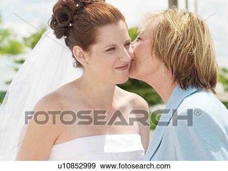 Stock Photo - Smiling, Wedding Dress, Veil. Fotosearch