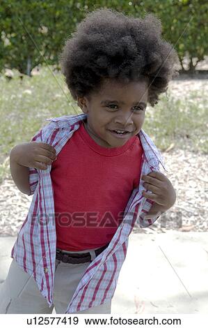 Portrait Of African American Boy Stock Photo U12577419 Fotosearch