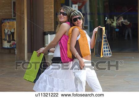Woman, Women, Shopping, Casual wear, T shirt, Skirt, Trousers View Large Photo Image Stock Image - Woman, Women, Shopping, Casual wear, T shirt, Skirt, Trousers. Fotosearch