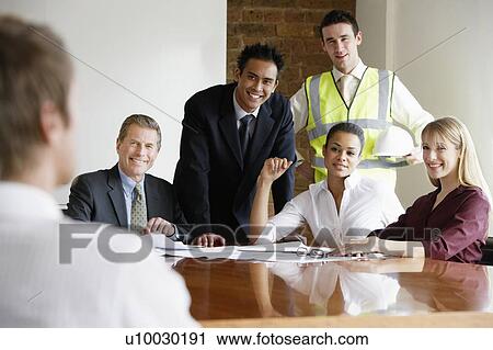 Business meeting. View Large Photo Image Stock Photography - Business meeting.. Fotosearch - Search Stock Photos, Pictures, Prints, Images, and Photo Clip Art