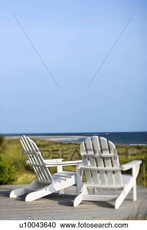 Adirondack chairs looking towards beach on Bald Head ...