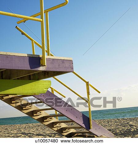 Art deco lifeguard tower on deserted beach in Miami, Florida, USA. View Large Photo Image Stock Image - Art deco lifeguard tower on deserted beach in Miami, Florida, USA.. Fotosearch