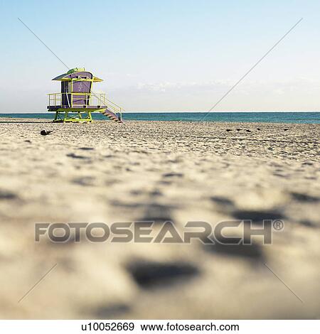 Art deco lifeguard tower on deserted beach in Miami Florida USA View Large Photo Image Stock Photo - Art deco lifeguard tower on deserted beach in Miami Florida USA. Fotosearch