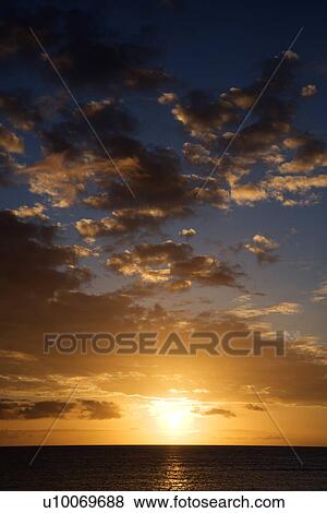 Stock Photo - Sunset sky over Kihei Maui Hawaii. Fotosearch