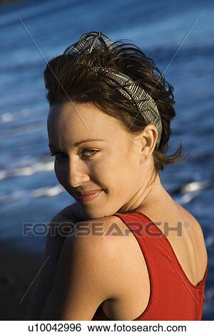 Young adult female Caucasian portrait on beach. View Large Photo Image Stock Photograph - Young adult female Caucasian portrait on beach.. Fotosearch