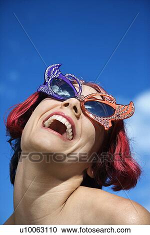 Close up of young adult Caucasian female wearing unique vintage glasses. View Large Photo Image Stock Image - Close up of young adult Caucasian female wearing unique vintage glasses.. Fotosearch