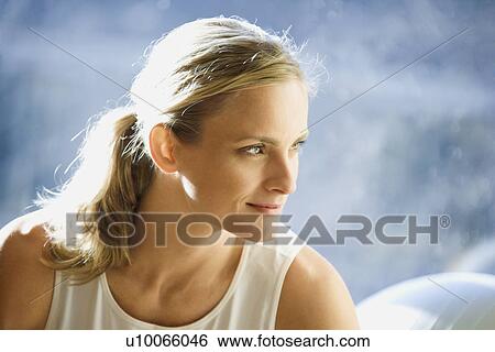 Stock Photograph - Portrait of prime Caucasian female adult at gym.. Fotosearch
