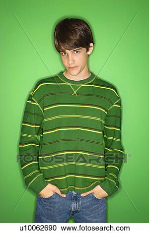 Portrait of Caucasian teen boy with hands in pockets. View Large Photo Image Stock Image - Portrait of Caucasian teen boy with hands in pockets.. Fotosearch