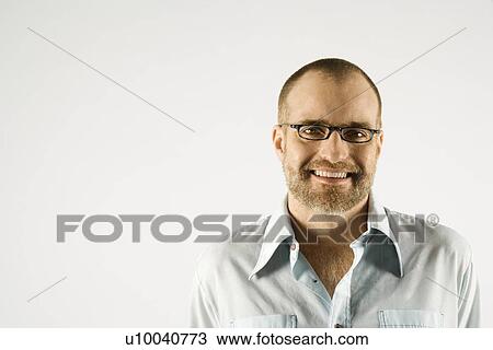 Head and shoulder portrait of Caucasian man smiling against white background. View Large Photo Image Stock Image - Head and shoulder portrait of Caucasian man smiling against white background.. Fotosearch